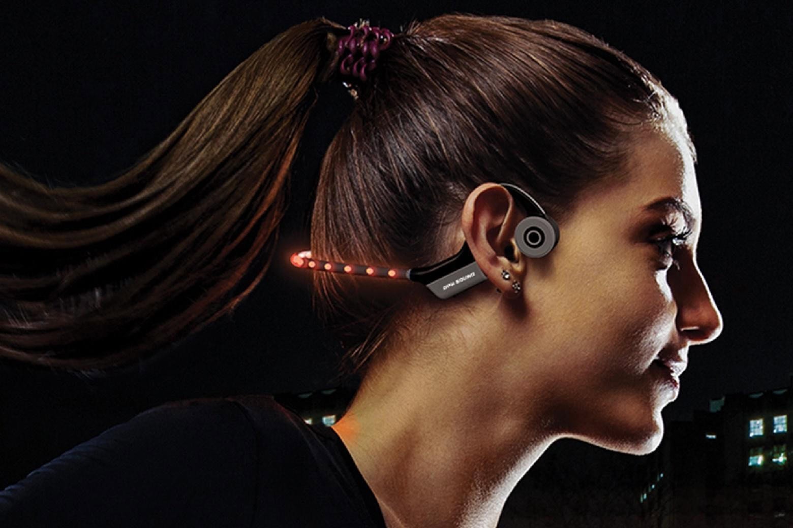 These $64 bone conduction headphones have an LED neckband for safety.