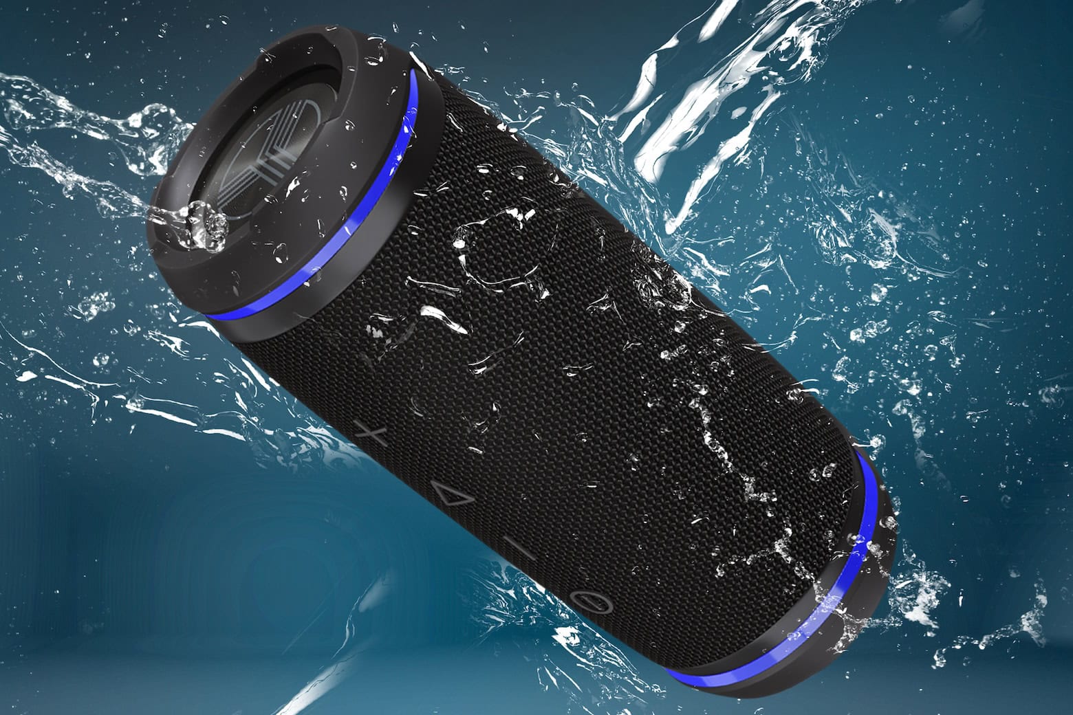 Product shot of Treblab HD77 Bluetooth speaker underwater. This waterproof and shock-resistant outdoor wireless speaker has a 20-hour battery.