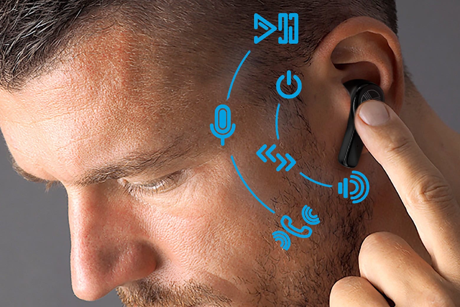 Man wearing TREBLAB WX8 True Wireless Earbuds.