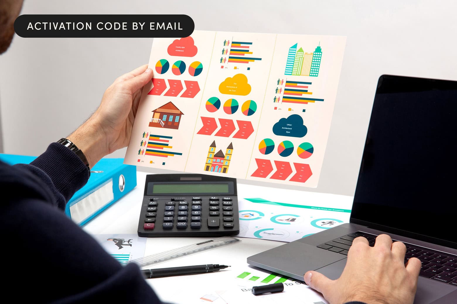 man looking at diagrams with laptop and calculator on the table while using Microsoft Visio 2024